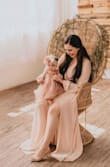 I purchased this dress to take mommy and baby pictures with my 6 month old. Ever since I gave birth, I have been very skeptical about ordering online since my body type has really changed. After reading reviews I purchased a size small and it worked out perfect! Runs a little long and big on the chest area but still looks and photographs beautifully. 10/10 recommend! - Lynda P.