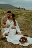 I ordered this dress for my elopement and loved it! Sizing was a bit tricky as I am usually a medium, 5'2, and 125, but I ordered a large since I was nearing my 8 month pregnancy mark. Beautiful well done dress! - Leslie H.