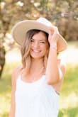 I used this hat for my senior pictures and loved it! It was a little bigger than I expected but still worked out! - Nyla S.