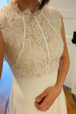 I am so impressed with this dress. I'm getting married on the top of a mountain with our 4 dogs. I know my dress will be a mess by the end of the day. I wanted a simple, elegant dress for a good price. This dress is PERFECT. I was so surprised by the quality of this dress for the money. A few loose strings that needed clipping, but otherwise it is beautiful. Fits like a glove. - Lisa B.