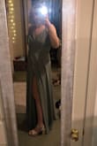 Amazing dress and value for price. The lining feels luxurious, and the wrap tie feels secure. I tend to buy size large because I have broad shoulders and long arms, but I returned the large and bought a medium. (first pic wearing large, second pic medium). The large had too much room in the bust for me but the medium fit perfectly, gave some cleavage without being too revealing. Great length, looks like a custom tailored dress when on. Can't wait to wear this to a wedding this spring. I bought the shoes on Lulus as well and they're perfect with this dress! - Megan O.