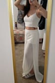 I love this little duo. I bought it to wear for upcoming wedding festivities. I ordered a size large because I always size up for my booty. I'm having the bottoms altered because they are very long and I'm wearing them with platform sandals and I'm not very tall and hate dragging pant legs. But they are well made and so comfy. - Lacy W.