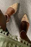Gorgeous. Best fits a narrow to medium width foot. Comfortable. Bottom can be a little slick. - Makeda W.