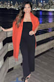 Fits true to size. I'm 5'6/ 145 lbs, and ordered a small that fit perfectly. I was concerned the arms would be too tight, but was glad I was wrong! - Karen N.