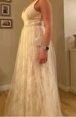 This dress fit okay overall but the top layer added a very unflattering look to it. Might work well as a maternity photo dress- because I looked pregnant wearing this - Kayla S.