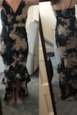 Bought this for my sister in laws wedding which is near a beach. I will be 6 months postpartum & still have a bit of a belly that sticks out so in the photos I do have spanx on. Snug in the hips and I'll need to find something to perk my chest a little because I don't fill out the top much but overall its a really nice dress and I'm excited to wear it. - Lauren G.