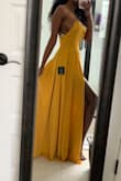 I love this dress. The color is great and the length is just right. It does have a lot of side boob action, especially for those that are busty (see photo). I was nervous about sizing since I normally order a size a small, but I'm really glad I got an extra small in the end. It fits perfectly, even with me being a size 32DDD. - Sonya K.