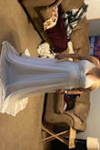 This dress is very beautiful, very elegant, lightweight, and perfect. We are renewing our vows in July at pigeon Forge and I was looking for something lightweight, since the end of July is going to be hot. I am in the middle of having a tummy tuck so I bought this to see what it would look like on me and I returned it so that I can buy a smaller size next month. - NICHOLE M.