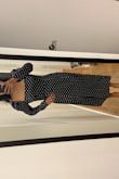 This dress is really cute and flattering. I'm going to wear it to a wedding next week. The sleeves are a little big and keep falling so I'm going to saw them a little bit tighter to the main piece. - Angelica E.