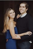 I wore this for my engagement shoot and it photographed so well! It's very flattering on, hugs you in all the right places, and is a beautiful deep shade of navy. The material is light weight, on the thinner side. Can be styled for any occasion. I'm looking forward to wearing it again! - Shawna E.