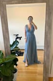 Unfortunately I'm a little bit between sizes, in the XS I can't take a deep breath but the S is too loose and I will have to have to altered. The light blue is a little darker than I was expecting as well. I still like it but the picture online looked much lighter. Over all I love the style and feel super elegant. - Emily S.
