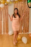Bought for my bachelorette night. Very nice looking dress. Good quality and design. Does run a little small, I had to exchange it for a Large. (Med wouldn't go past my hips!)  I got the 'blush pink' color, however it is more of a peach color. Either way I was fine with the color. - Veronica O.