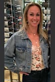 I size up on most bodysuits because after washing they get so short that the bodysuit peeks out at the waist of pants (where you can see some of my hip). This bodysuit is soft and is cut well at the bottom of it (not so high that you can't wear normal shorts with it). - Alison G.