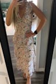 Fits so nicely and the ties at the shoulders are adjustable! Shipping was a little wonky but the dress is not! - Lauren S.