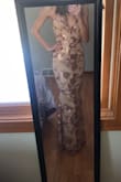 The dress is so pretty, and is very comfortable to wear. It is a little loose at my waist, but other than that is is a great dress. - Connie Z.