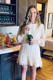 I wore this dress to my bridal shower and it was a hit! Very comfortable and flattering. I didn't want to wear a traditional white dress, so the cream color was perfect. I adore the see through sleeves also - very elegant! - Jade M.