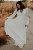 I originally ordered size S and it was very small for me, I ordered Medium and as you can see in the picture it is kinda loose. But you need to make sure to wear heels because it was so long! Overall is a 8/10 - Niyousha M.