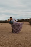 Beautiful dress. Perfect for weddings & my engagement pictures. I do wish it came in a shorter size. It cost more to have it hemmed than to purchase. - Angela K.