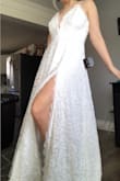 Gorgeous dress. A little loose on my bust but I'm going to alter it. The fabrics are high quality and I feel amazing in it. It's hugging but not too tight. I'm excited to wear this for my mountain top elopement. - Raelle V.