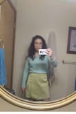 I like this skirt a lot. It's short, but not too short. It looks less green than online and more yellow. It goes with anything basically. Only downside is that it gets wrinkled easily. - Jessica H.