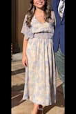 Beautiful dress, the blue in it is so pretty and it's perfect for spring. I'm very petite and usually wear an xs. The top was WAY too loose so I got it tailored to fit, since it was so pretty that I didn't want to return it. - Christine V.