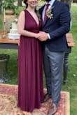 I brought this dress for my sister's wedding (I was her maid of honor), and I ABSOLUTELY loved it!, I felt like a total goddess and got so many compliments.
At first I was a bit nervous about the color (is a mix between red wine and maroon) but it is truly beautiful.
I think the dress is made for taller girls, to me the skirt was a bit long, and also the cleavage, I had mine altered, but other than that I love it! Would definitely recommend - Astrid S.