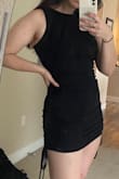 This dress delivered. It fit to my shape so swell and the strings are so sexy. Went to the club in it and even got a compliment from the doorman on it. Buy this! - Rayna K.