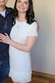 I wore this to my bridal shower! It's such a cute dress and perfect if you're doing something more casual. I usually wear small or medium and went for a small here and thought the fit was great, not too tight or short. Altogether, can't go wrong with this dress! Also would recommend a little steaming to de-wrinkle the dress before wearing. - Audrey Z.