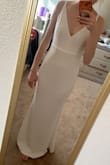 I love the fit and style of this dress! It's so simple yet super classy. I was debating between a small and an extra small, got the small and it fits great! It is also super comfortable and has a perfect amount of stretch while still being form fitting and super flattering. I can't wait to wear it at my reception! - Caitlin S.