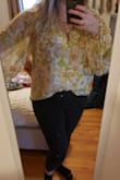 I wanted to love this shirt so much, the pattern is so vintage inspired and the colors are true in person, But this blouse has that oversized fit with the balloon sleeves, and this just looks matronly on me. If they had this pattern/fabric but on a more youthful shirt, like a twist-front or something, I think it would be incredible. But this blouse style didn't do it for me :( - Cassie F.