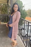 My normal size is Medium but after reading prev reviews I decided to size down. I'm glad I did and it was still comfortable and roomy for my baby bump! The material is extremely smooth and I was able to pair it with a crochet cardigan. Everyone adored me! Absolutely love this dress! I can see myself wearing this dress throughout the remainder of my pregnancy - Justine R.