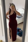 I got this dress as a simple, elegant prom dress and I haven't worn it to prom yet, but I love it already. The material has a little bit of stretch in case you are curvy (like me)! I got a small and it fits perfectly. - Emma K.