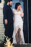 I definitely needed smoothing/shape wear under this dress- you can see every line for sure, and I needed the hips taken in a little. I got the xl, I am a 12/14, large/lx. But it looked just right in pictures! I'm waiting for the professional ones to come back in- but it makes a sweet little wedding dress - Ashley H.