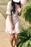 This dress was such a winner for my bridal shower! It fit me so well and I received so many compliments! I usually wear a size 6-8 and a medium, but based on other reviews I ordered this dress in a large. The large was perfect! It does not stretch at all and was a decent length on me, but I do have shorter legs. I would recommend this, but definitely size up! :) - Andie A.