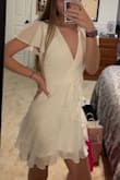 The length of this dress is perfect and I love the style, but if you're not gifted in the chest area, than you're going to need to pin or tack the part that crosses over. Other than that, just make sure you have the right measurements before buying! - Megan M.