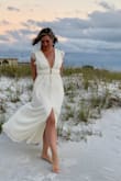 This dress was EXACTLY what I pictured wearing on our trip to the beach for a vow renewal, and I didn't even need to iron it! I didn't wear a bra, the material is so soft, I felt like I was in a nightgown. Highly recommended - Kim B.
