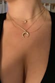 Love these! The one with the gem & the crescent moon are one necklace and the thicker leaf patterned necklace is another. So if you're not feeling the choker you can opt out or wear it separately! A good necklace/set of necklaces just makes you feel so powerful & these do exactly that! Stoked to wear them! - Tamara S.