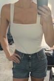 I loved it so much I bought both the black and white. Fits perfect and is flattering, would definitely recommend! - Kimberly P.