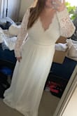 Got this for our summer camping wedding, the material is pretty heavy for the bottom, but I'm just going to get a slit put in. It fits perfectly and the lace is not scratchy at all. - Michelle B.