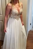 This dress is absolutely beautiful. Great quality! The beading is all I hoped for and more. It's even more beautiful in person. I would highly recommend this dress-you won't be disappointed!! - Kris R.