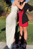I bought this for my best friend's engagement party and loved it! I'm usually a true Medium and found this Medium ran a tad big. It still worked well though because it wasn't too short.  If you are in between sizes maybe consider sizing down. The tie in the back is so cute too and adjustable so you can tighten or loosen if you need. - Dylan F.