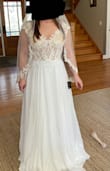 I love this dress! The material is great and does not cling where I don't want it to. It cinches at the waist and the lace detailing is beautiful. - Rachel Z.