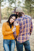 I wore this for my engagement pics and I wore it under my cardigan that I ordered from Lulus! And it fit perfectly! I love how comfy it was too! - Heather B.