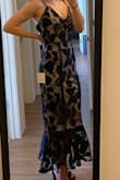 The dress arrived exactly as in the pictures, it's really beautiful! It was just a bit long in my opinion as I wanted it to end on the calf and it goes to my ankles. I plan on having it altered and sewing cups in the bust because the top was a little big for my breast size and I won't be wearing a bra. - Yelena S.