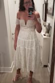 I love the midi, classic style. It works for me because I'm taller with a smaller chest. Without a bra, it's a little loose on one side of my chest (uneven bust sizes) but I think with a strapless bra, it will hold right up. I could even pin the top to the bra. Or get it taken in professionally. It's exactly what I expected, if I ordered smaller it would be too tight on the sleeves (I think expecting an exact fit on every inch of a formal dress is silly anyways) I am very hippy but the dress is at natural waist so it works.
I am very very happy with this purchase. Great value for the price. Material looks nice too. - Jacquelyn