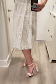 Exactly what I needed. The heel isn't too high. It's thicker and stable. I'm sure my pinky toes will hurt after an hour or more on my feet, but that's to be expected with this style. I'm a size 10 who find some 10s to be to tight, but not this shoe! - Jacquelyn