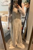 I can't say enough good things about this gorgeous dress. The material feels so high quality, and the weight of the dress and train feels like it should cost way more! The nude color underneath goes well with my medium skintone, and the lace details get prettier every time I look at it more. It's a very long dress! I'm short, so I'm getting it hemmed and adding 3 bustles. The neckline is so elegant, and perfect if you have a smaller bust like me. The sleeves are too long and the back is subtle enough when showing skin. The train is not too much, but still gives some drama! It's my dream dress at an affordable cost. I've seen nude boho lace dresses from 1k-3k! If you have a vintage boho wedding, this is the dress! Can't wait to wear it for our micro wedding. Photos are true to color! - Nicole E.