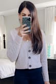 Truly the cutest. I don't need to bare my midriff at my age but this is perfect with the sweater and mom jeans - Sapna D.