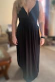 Bought this dress for my friend's wedding and I love it. The photo attached is with no bra, but I will wear a bra day of to give the girls some love lol. I'm usually between a medium and large but am so glad I went with the medium. The zipper is kind of annoying but not a deal breaker. - LeeAnn R.