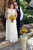 I love this wedding dress! Fit like it was made for me, it was a bit long until I put on my shoes then it was perfect. Great quality material, wrinkles came out with iron on low. - Pamela S.
